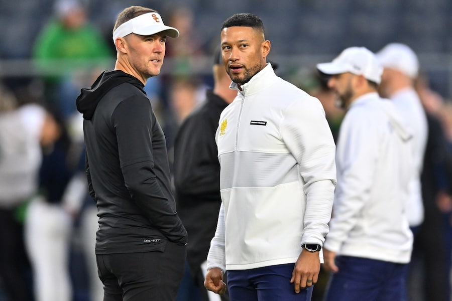 USC Trojans head coach Lincoln Riley and Notre Dame Fighting Irish head coach Marcus Freeman.