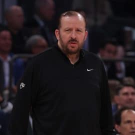Tom Thibodeau stands on the sideline.