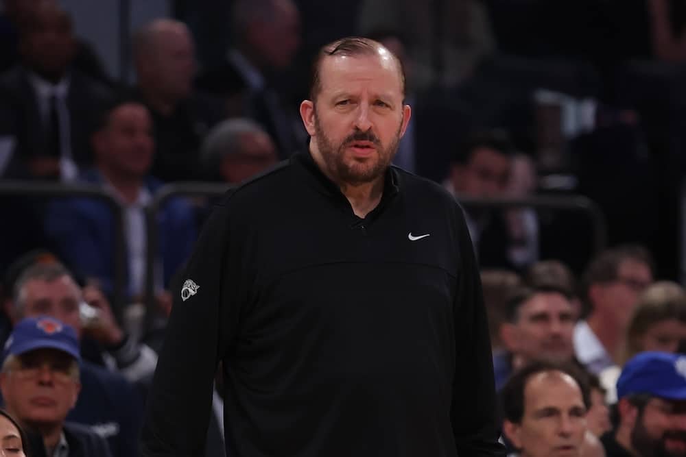 Tom Thibodeau stands on the sideline.